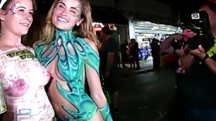 beautiful festival girls exposing their skin halloween street party fantasy fest